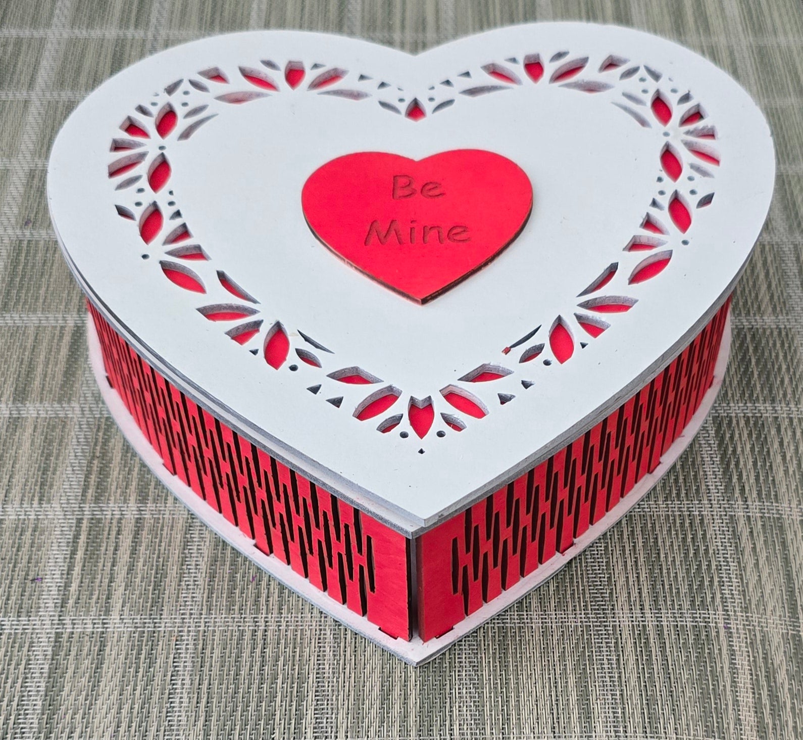 Engraved heart wooden keepsake box for jewelry and sentimental storage.